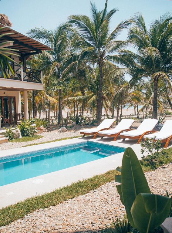 Casa Kuaa features a private beach, outdoor pool and boho chic accommodation.